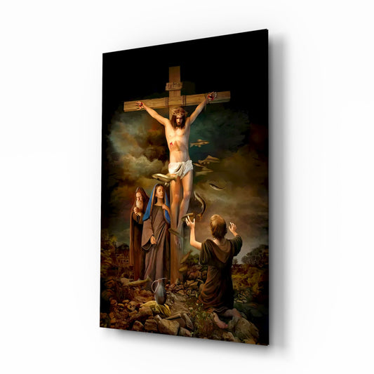 Glass wall art panel displaying crucifix scene with Jesus figure, robed figures below, dramatic sky, mounted at angle showing depth and shadow.