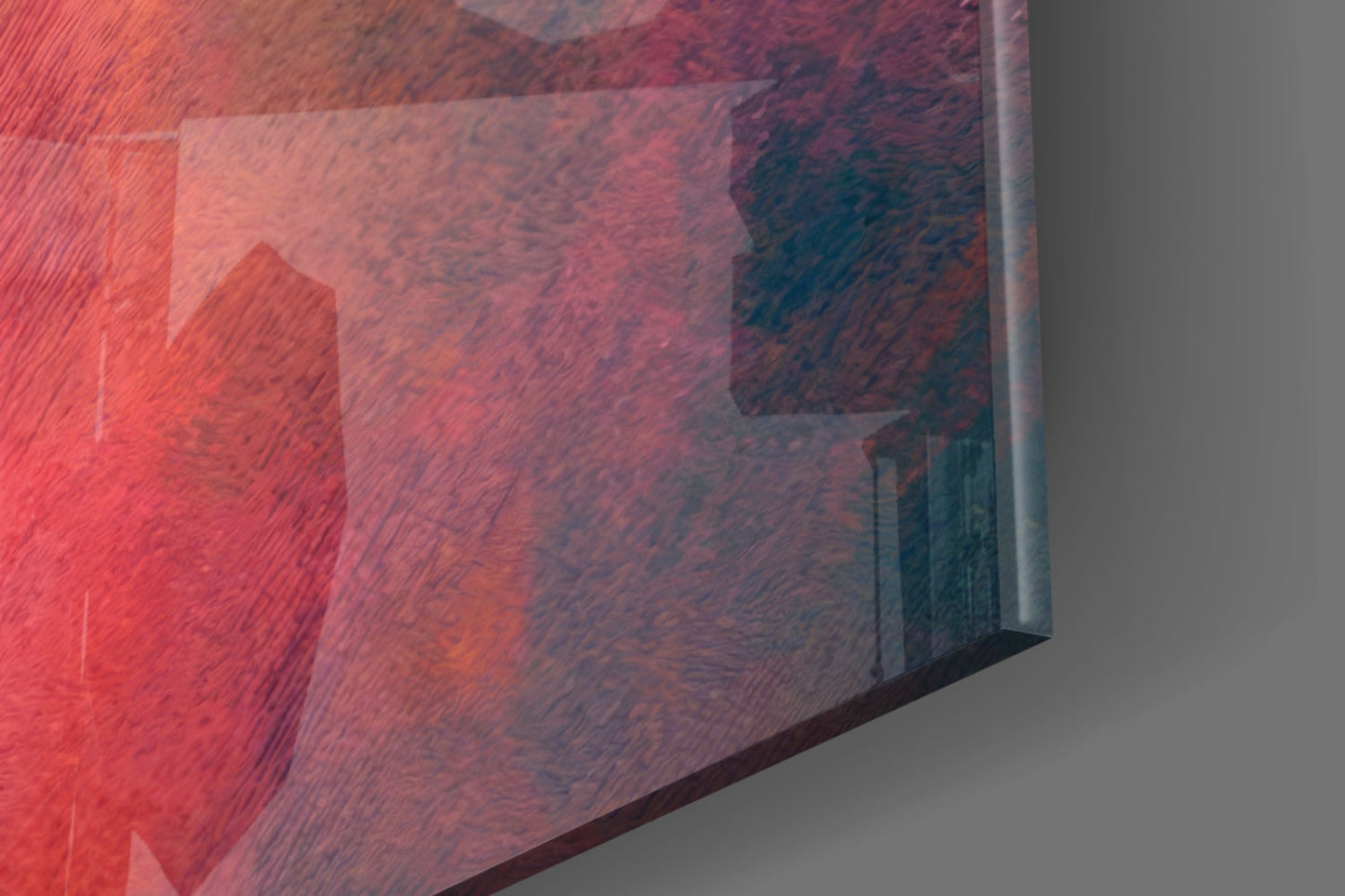 Close-up angled view of Pray Glass Wall Art showing layered red and burgundy tones with textured surface against neutral background.