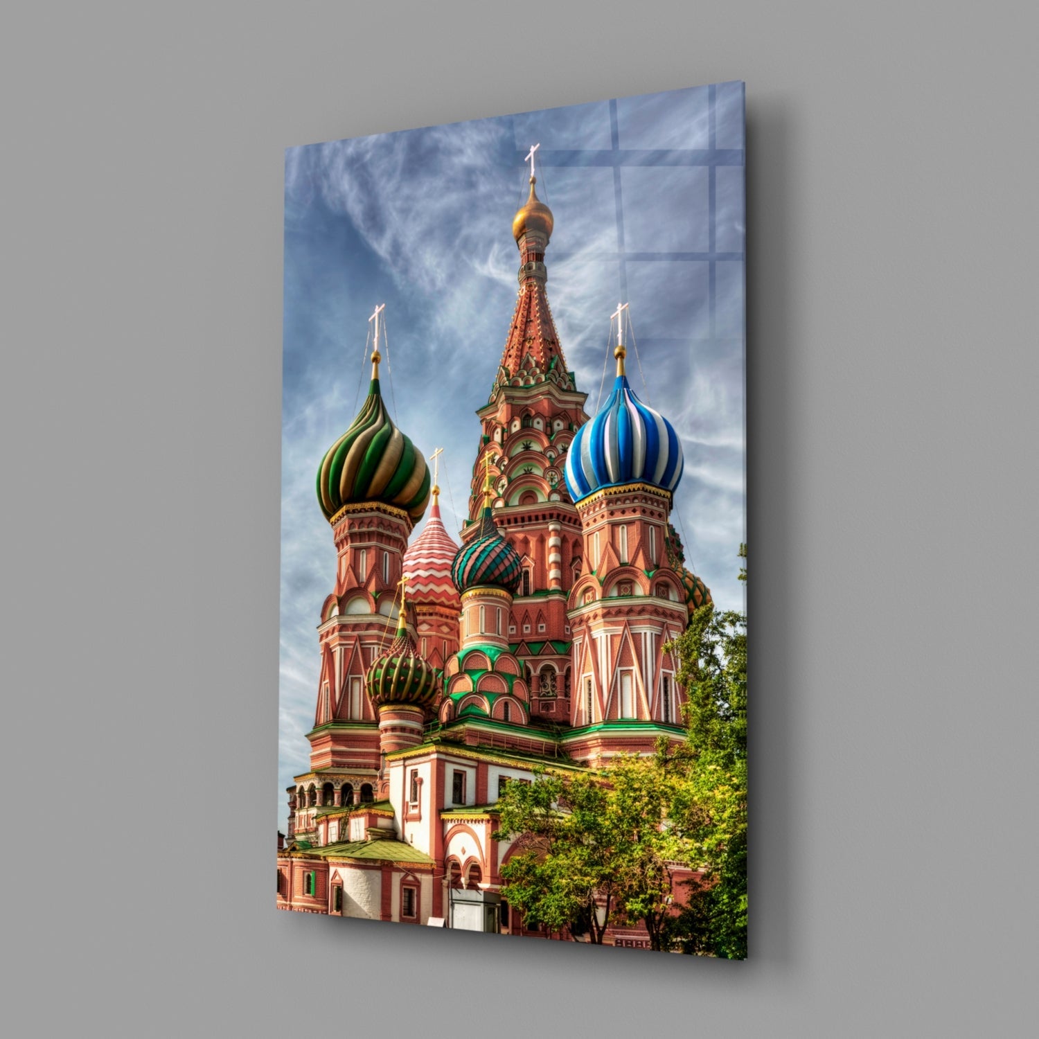 Saint Basil's Cathedral glass wall art displayed at an angle, showing colorful onion domes in green, blue, and red against a cloudy sky.