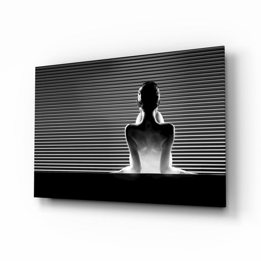 Black and white glass wall art featuring a shirtless figure viewed from behind against horizontal line pattern background.