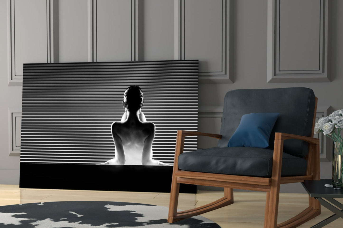 Black and white glass wall art featuring a silhouetted figure against horizontal lines, displayed in a modern living room setting.