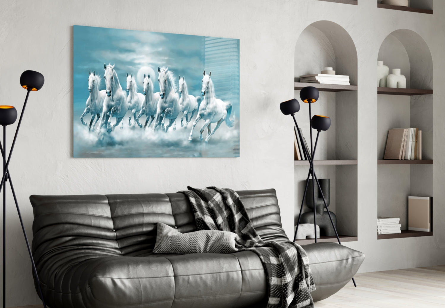 White horses glass wall art hanging above black leather sofa in modern living room with shelving.