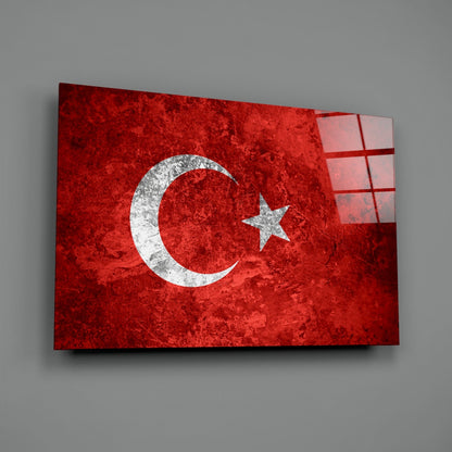 Turkish flag glass wall art displayed at an angle, showing red background with white crescent and star symbol.