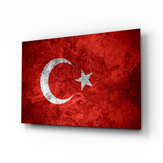 Turkish flag glass wall art with white crescent and star on red textured background, displayed at an angle.