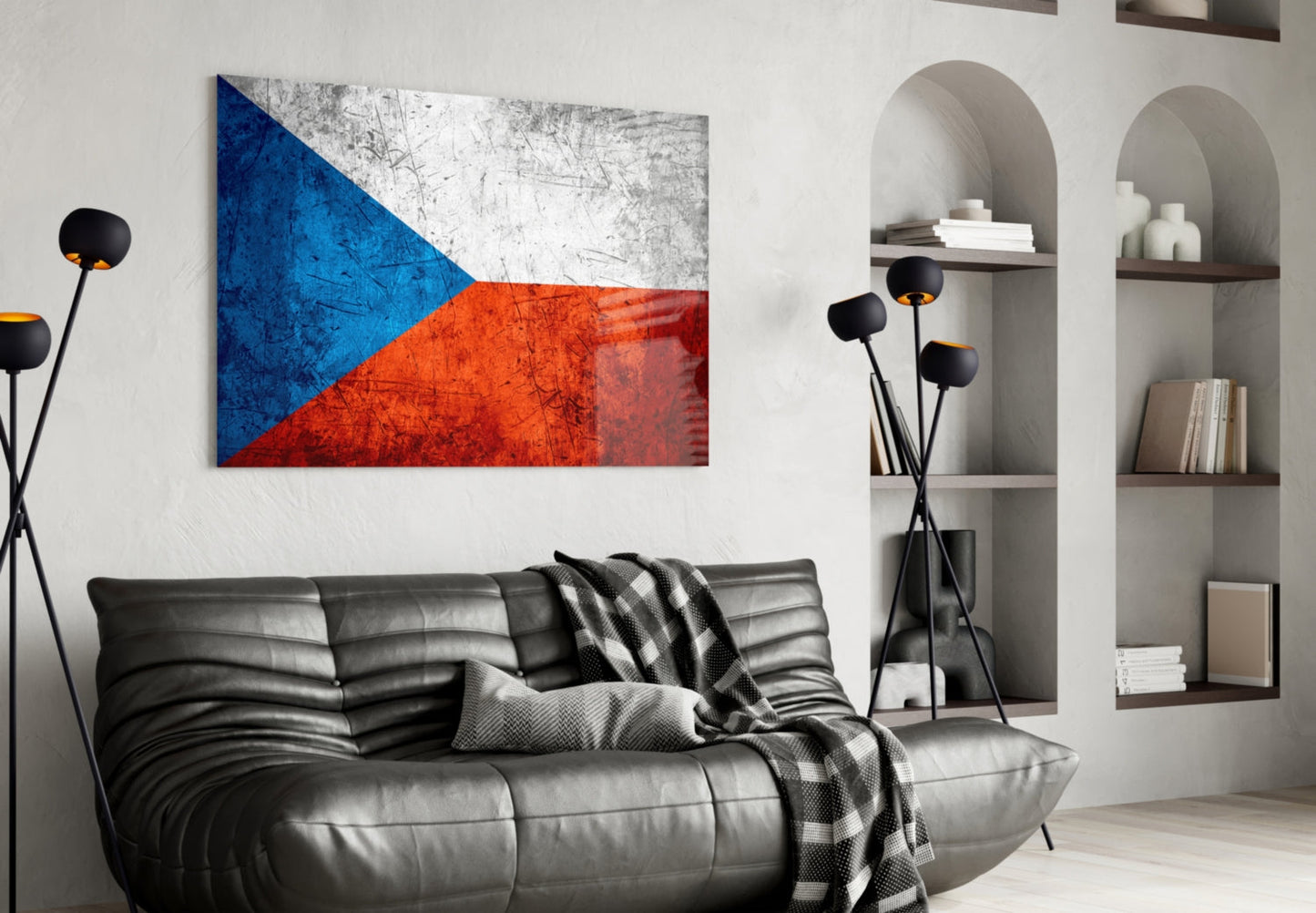 Czech flag glass wall art with blue, white, and red distressed finish displayed above black leather sofa in modern living room.