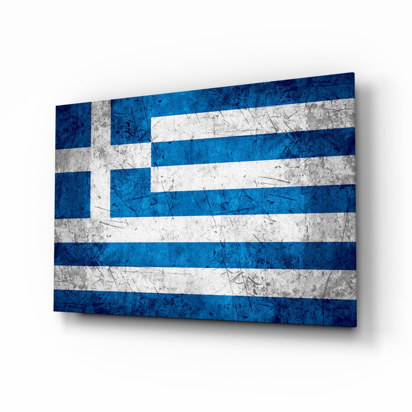 Greek flag glass wall art displayed at an angled perspective, showing blue and white horizontal stripes with a cross in the upper left corner.