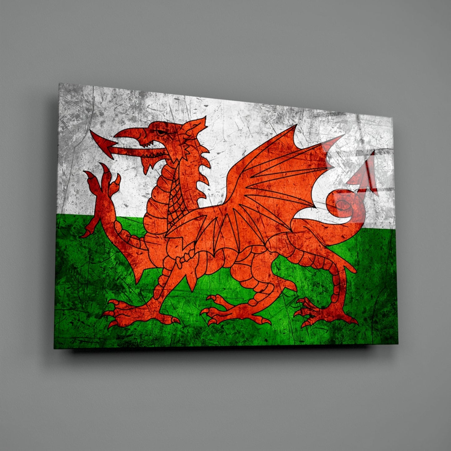 Welsh flag glass wall art displaying red dragon on white and green horizontal stripes with distressed texture.