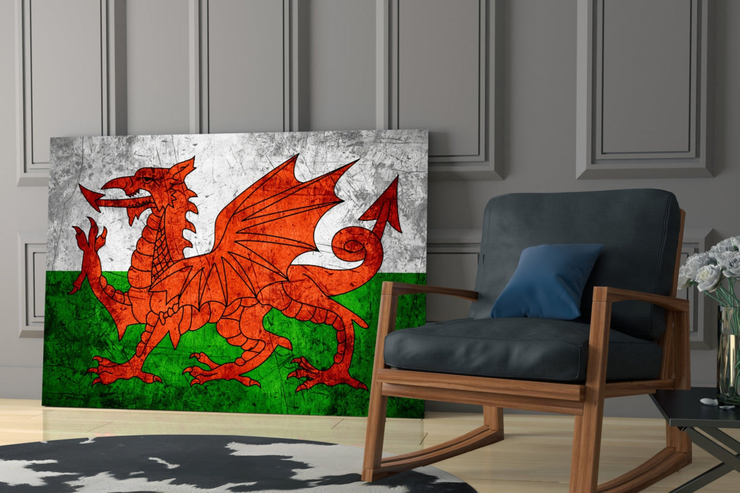 Welsh flag glass wall art displaying red dragon on white and green background, displayed beside wooden chair in modern interior.