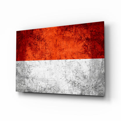 Angled perspective view of Indonesian flag glass wall art with red and white horizontal stripes featuring distressed texture.