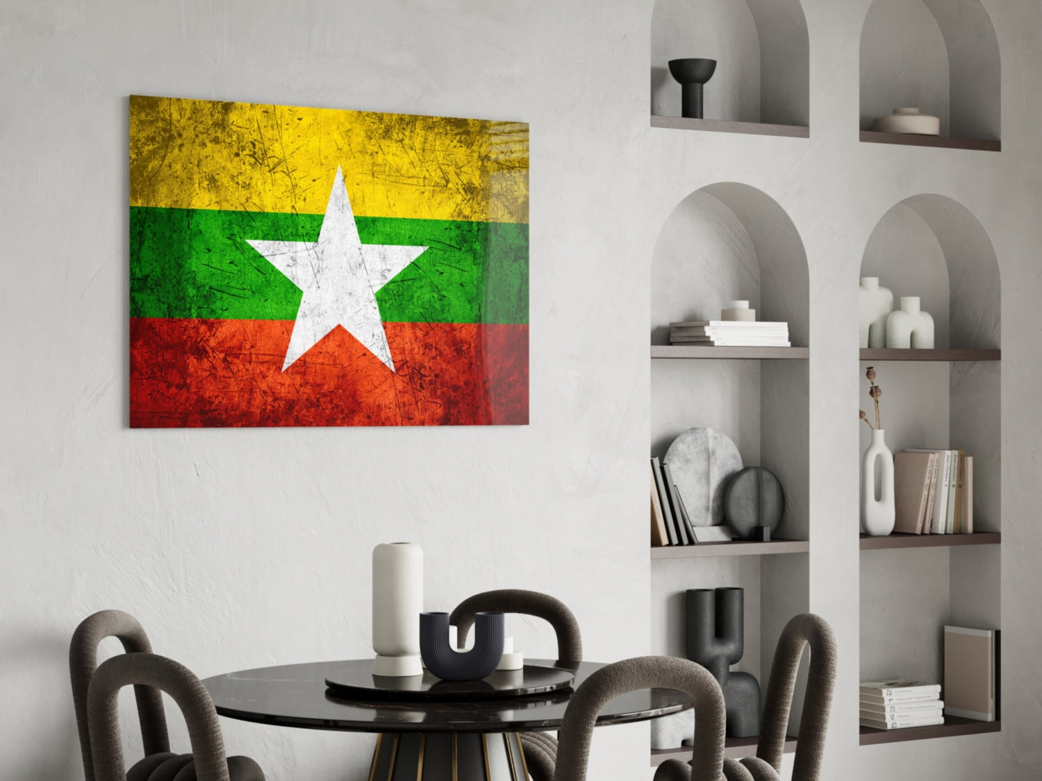 Myanmar flag glass wall art with yellow, green, and red horizontal stripes and white star, displayed above dining table in modern interior.