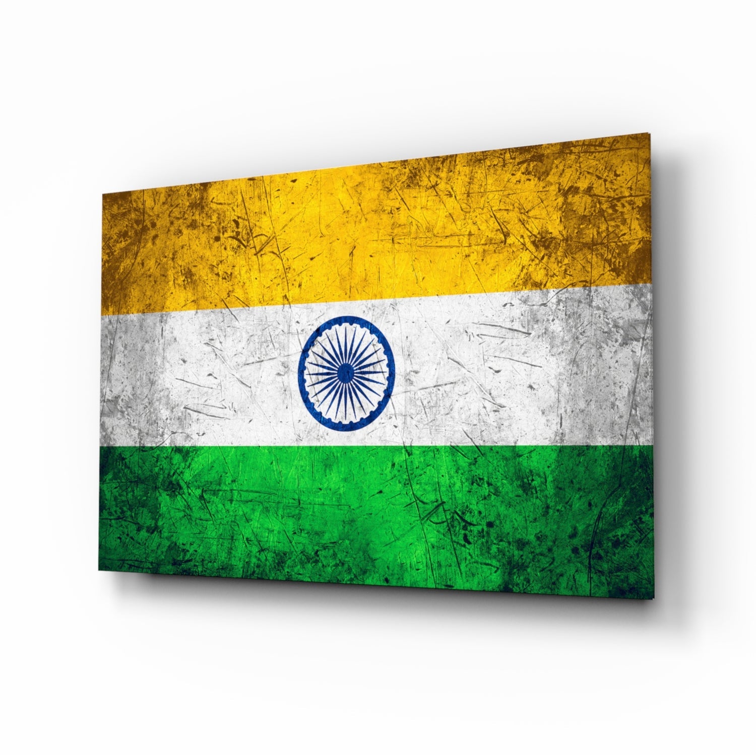 Indian flag glass wall art displayed at an angle, showing weathered yellow, white, and green horizontal stripes with blue Ashoka Chakra emblem.