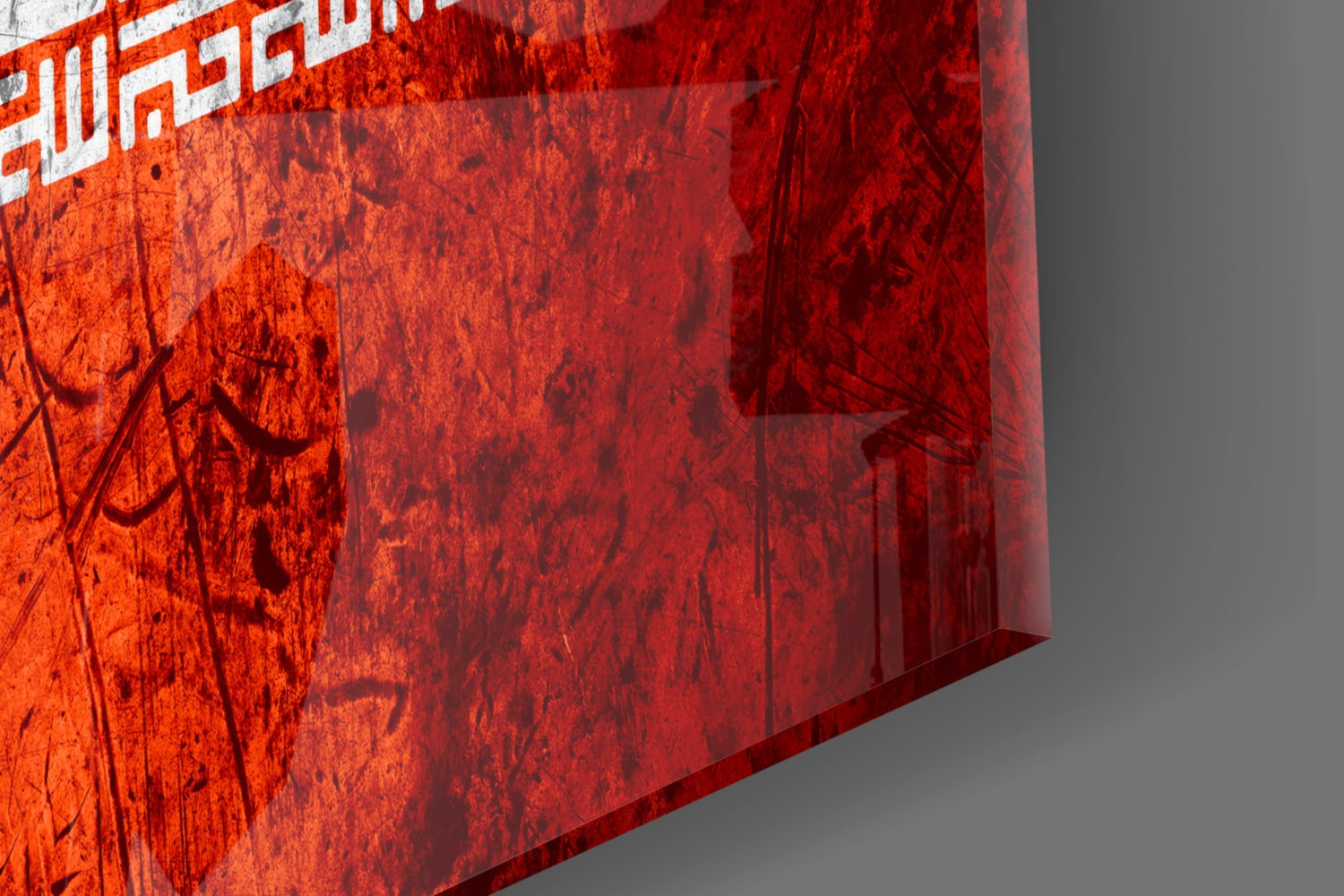 Red translucent glass panel with distressed texture and white text at top, angled perspective against gray background.