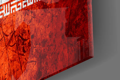 Red translucent glass panel with distressed texture and white text at top, angled perspective against gray background.