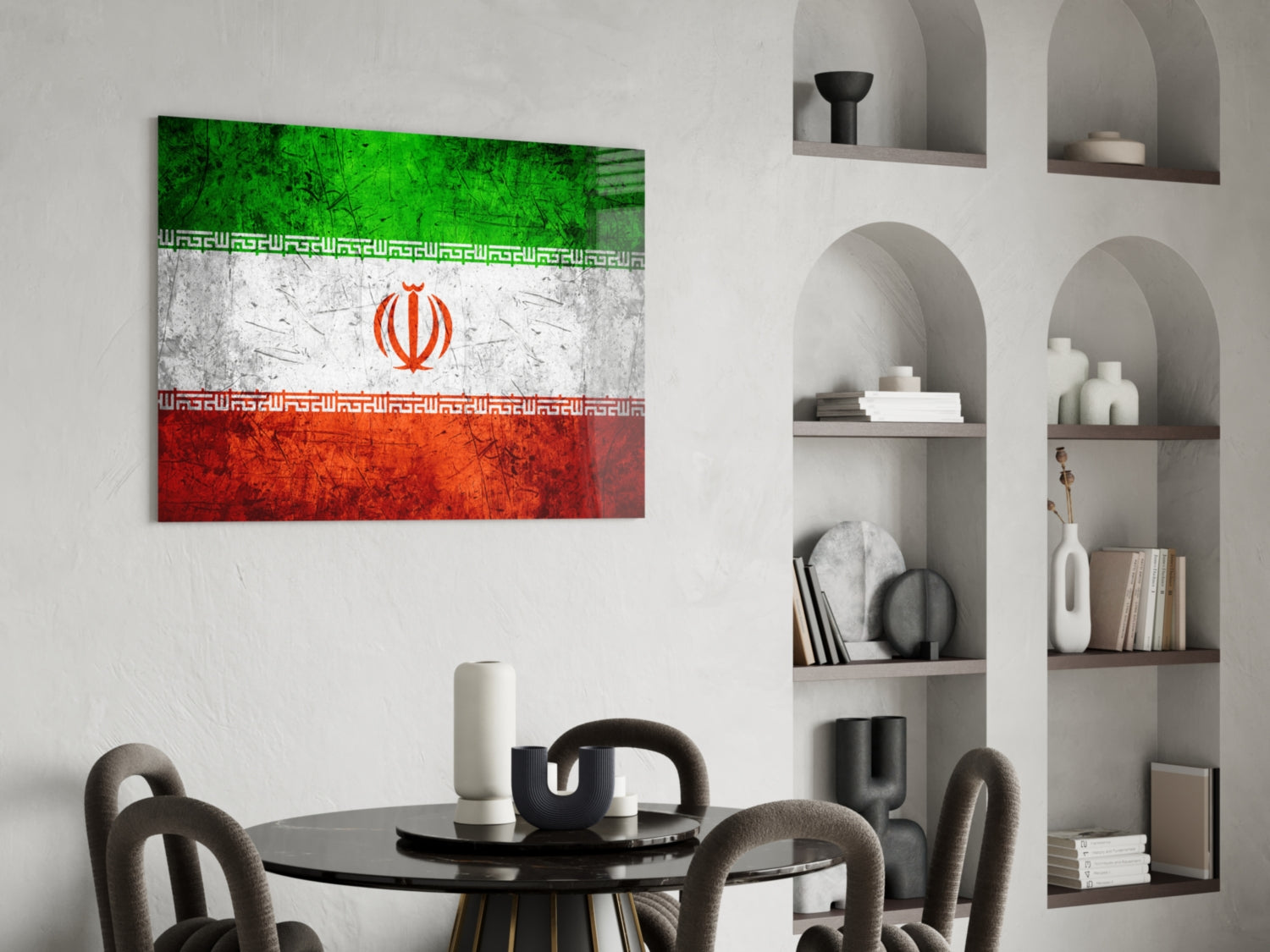Distressed Iran flag glass wall art displayed above a round black dining table with gray chairs and white shelving unit.