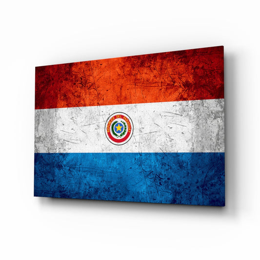 Angled perspective of a glass panel displaying Paraguay's flag with horizontal red, white, and blue stripes and central seal, featuring a distressed metal texture finish.