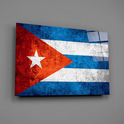 Cuban flag glass wall art displaying red, white, and blue horizontal stripes with white star, mounted at angle against gray wall.