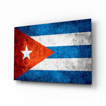 Cuban flag glass wall art displayed at an angle, showing red, white, and blue horizontal stripes with white star, weathered surface texture.