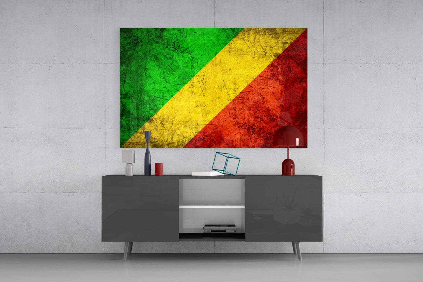 Republic of the Congo flag glass wall art displayed above a dark gray media console in a modern living room setting.