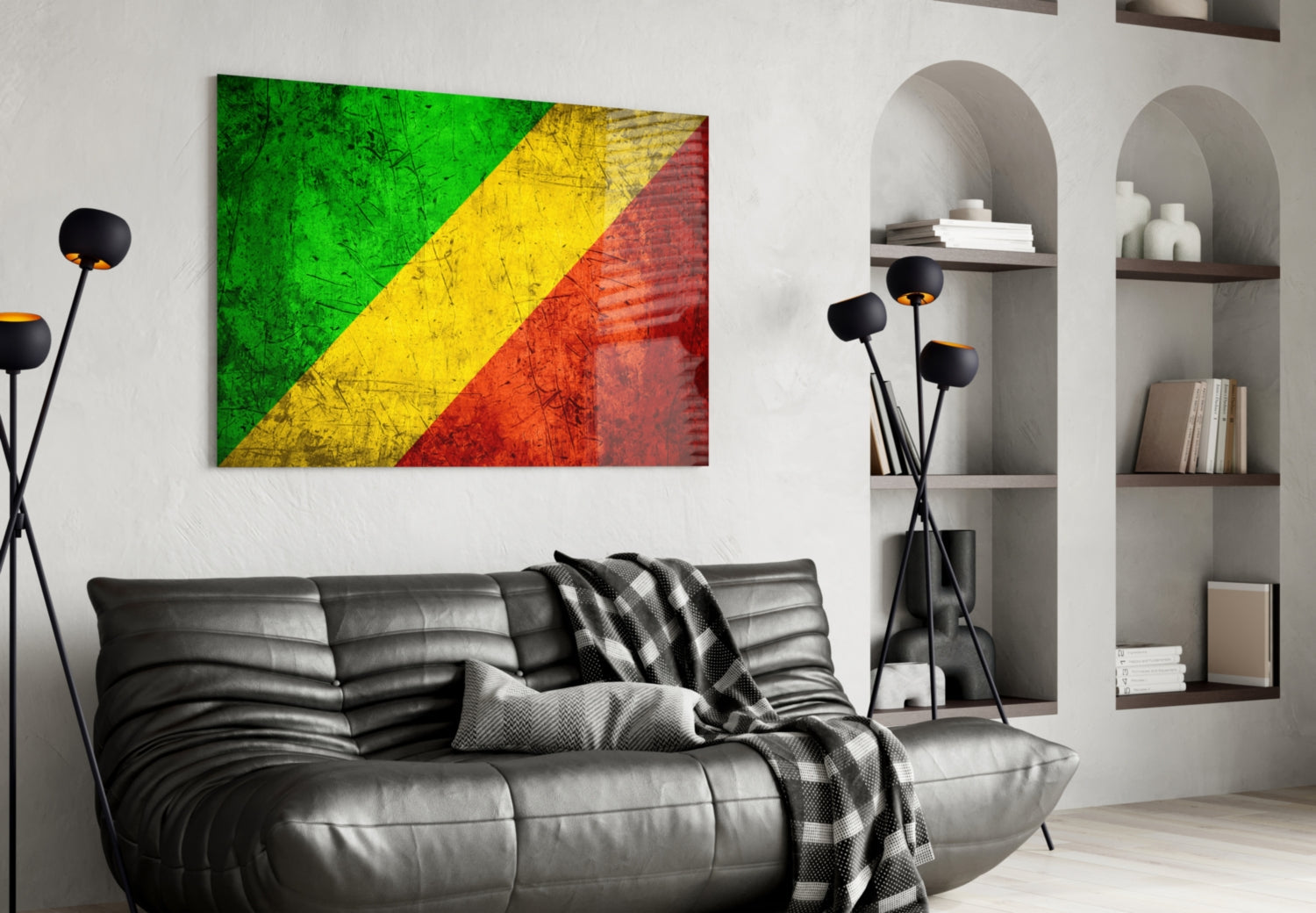 Republic of the Congo flag glass wall art displaying green, yellow, and red diagonal stripes hung above black leather sofa in modern living room.
