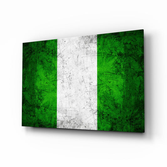 Angled perspective view of Nigerian flag glass wall art displaying green, white, and green vertical stripes with weathered texture.