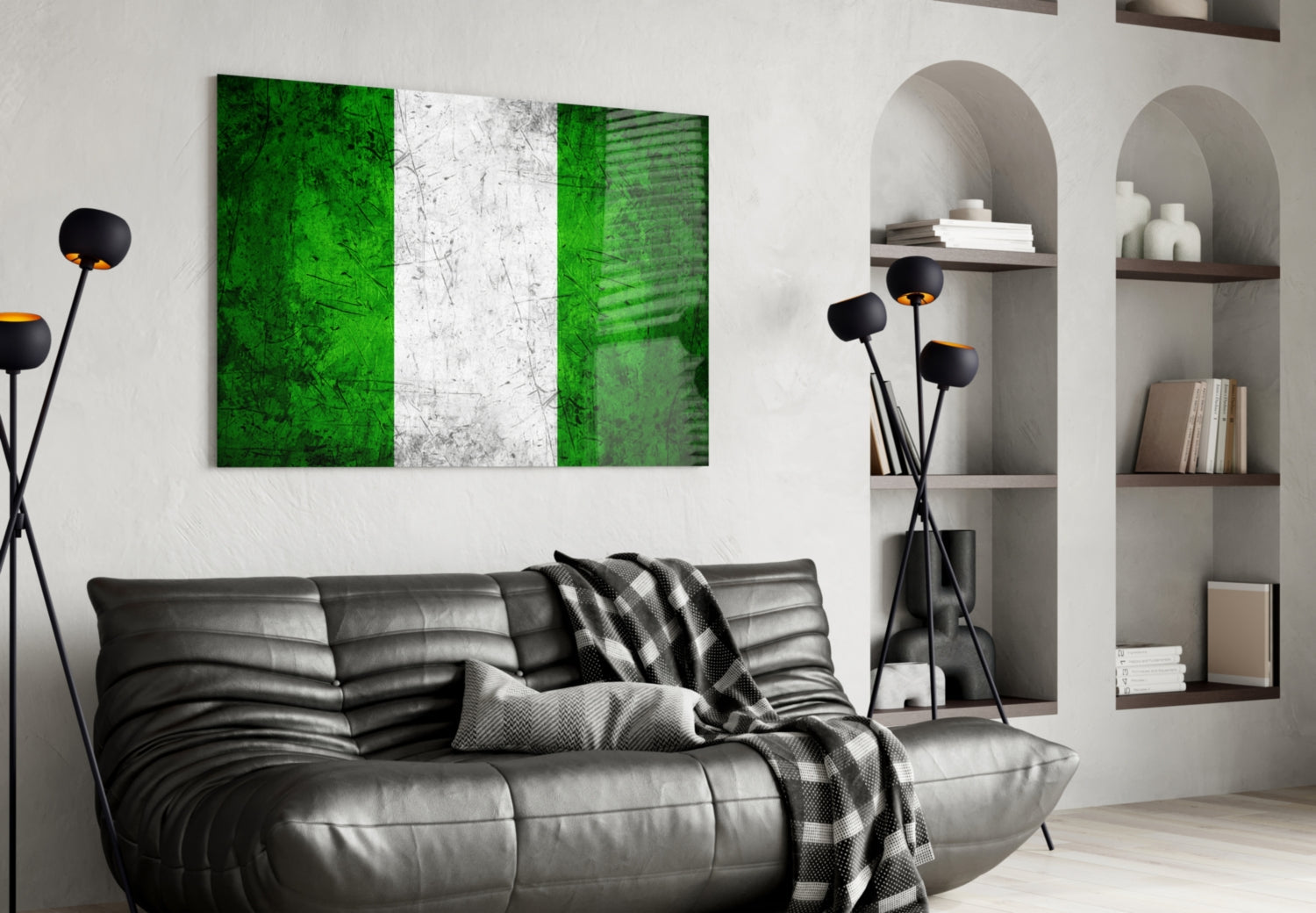 Nigerian flag glass wall art with green, white, and green vertical stripes displayed above black leather sofa in modern living room.