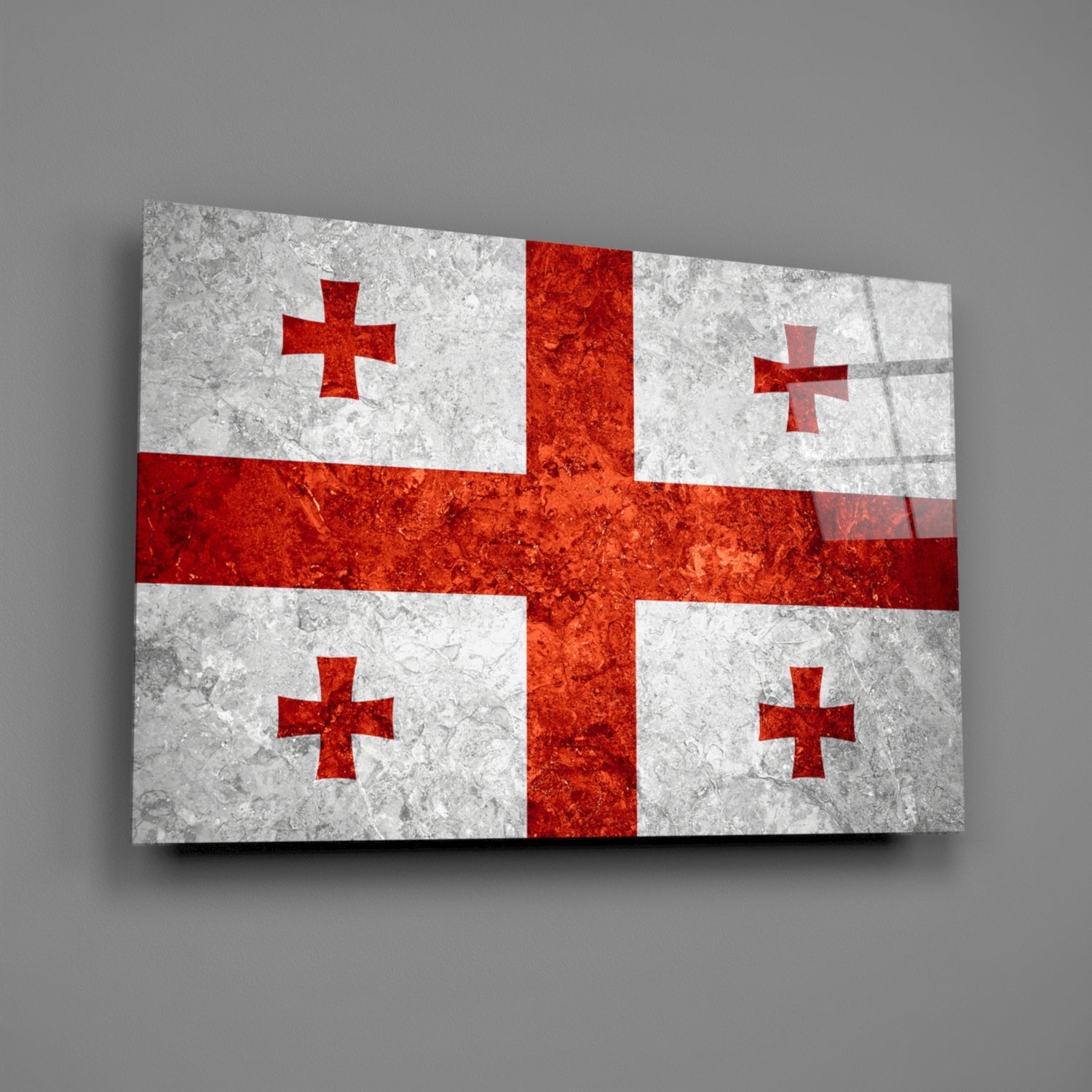 Georgian flag glass wall art displayed at an angle, showing white and red quarters with red crosses, textured surface.