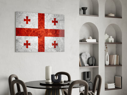 Georgian flag glass wall art with red crosses on white background displayed above round black dining table with grey chairs.