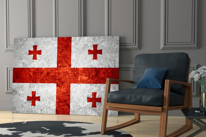 Georgian flag glass wall art displaying white and red cross design displayed in modern living room next to wooden chair.