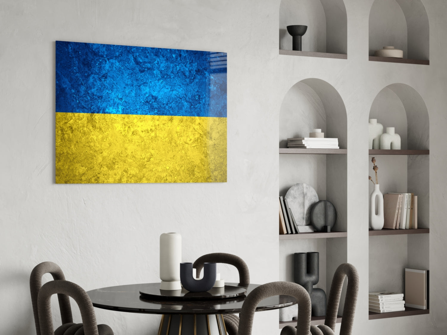 Ukrainian flag glass wall art with blue and yellow horizontal stripes displayed above dining table in modern interior.