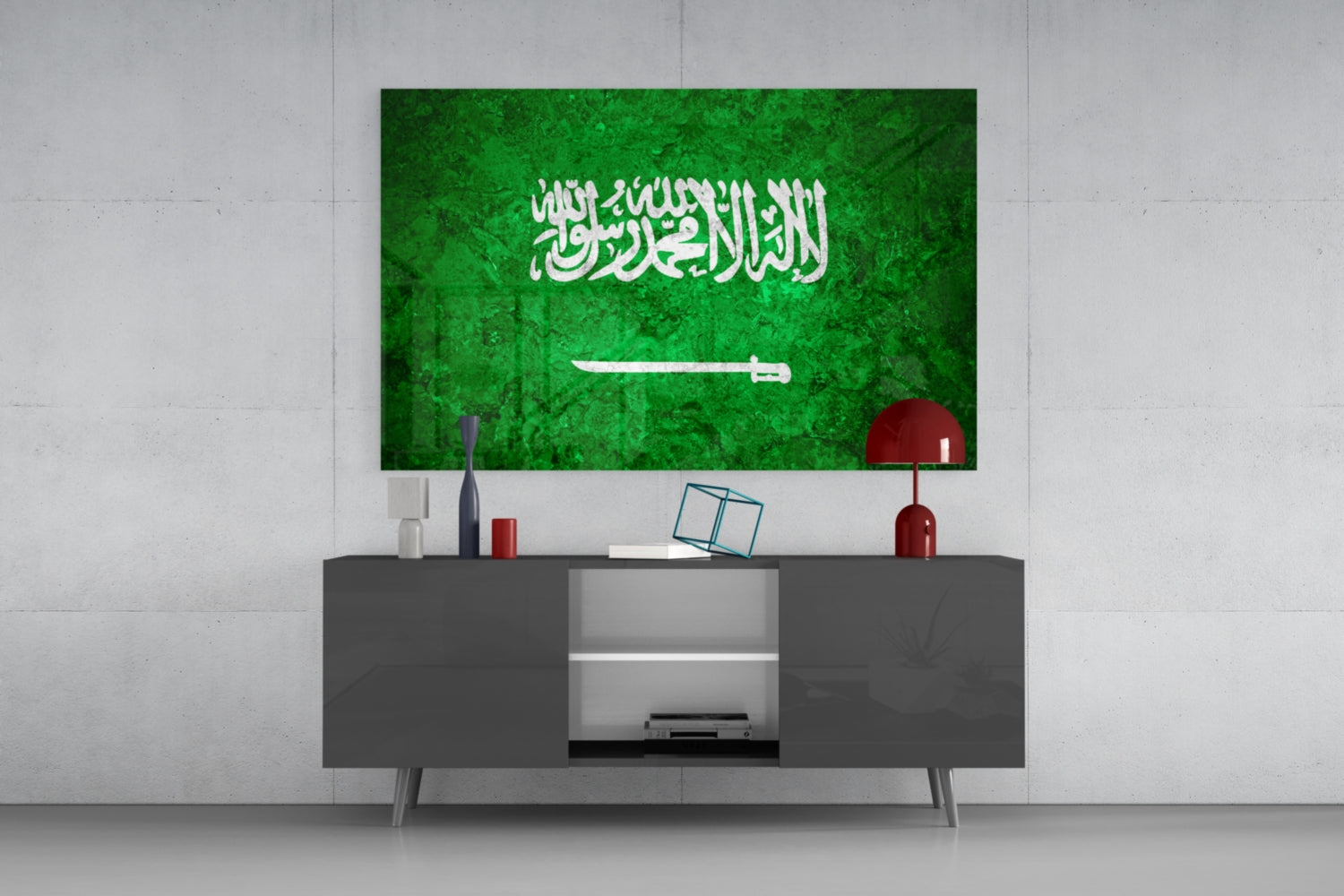 Saudi Arabia flag glass wall art displayed above a dark gray media console in a modern living room setting.
