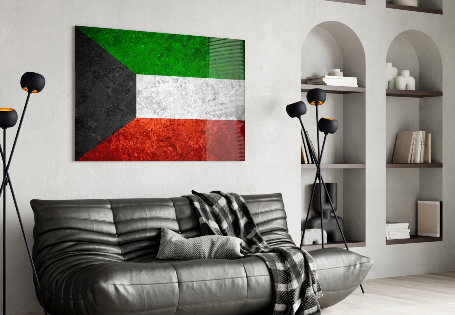 Kuwait flag glass wall art hung above black leather sofa in modern living room with shelving unit.