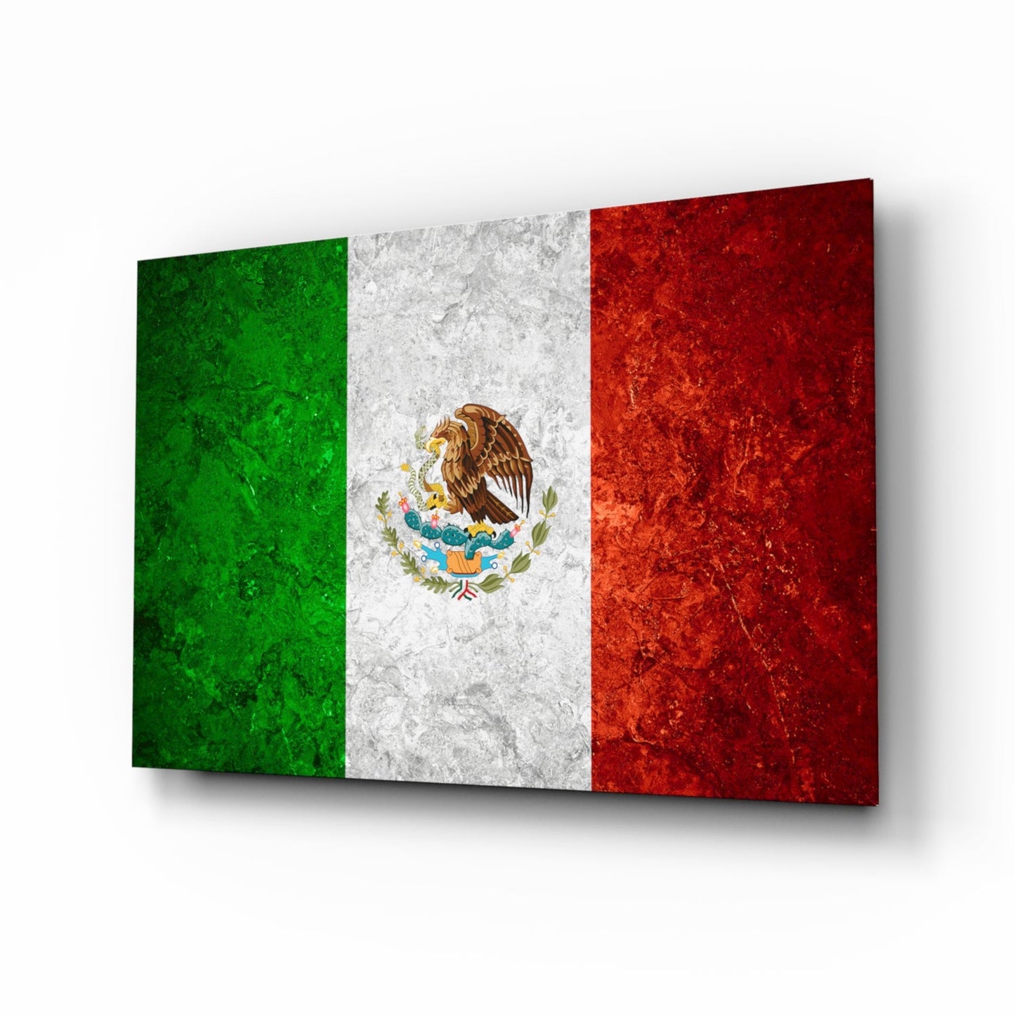 Mexican flag glass wall art displayed at an angled perspective showing green, white, and red vertical stripes with central eagle emblem.