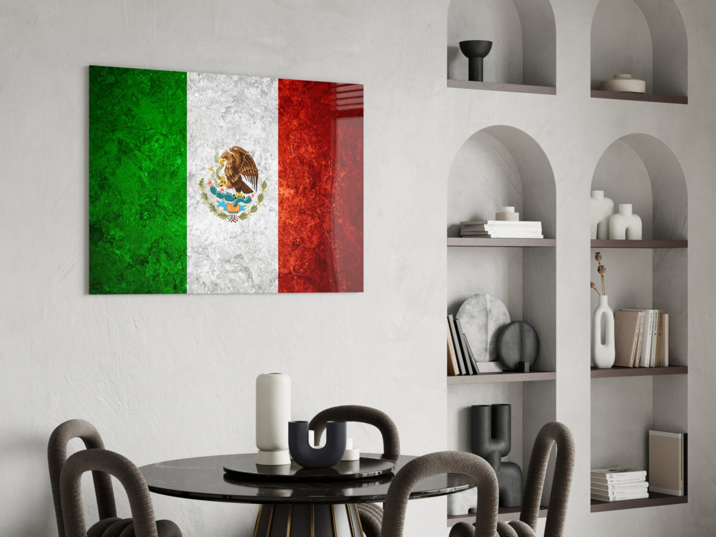 Mexican flag glass wall art with green, white, and red vertical stripes and golden eagle emblem displayed above dining table.
