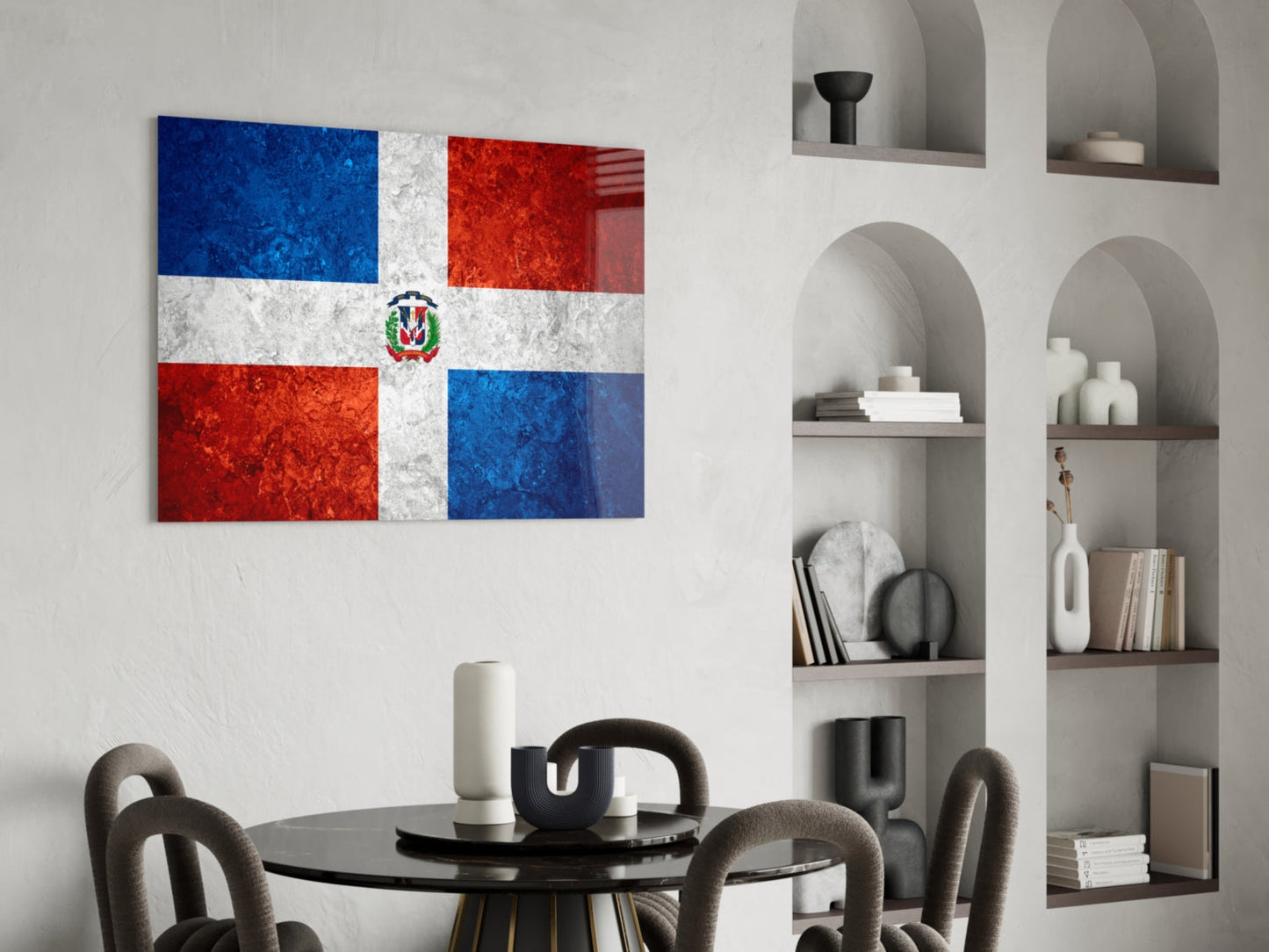 Dominican Republic flag glass wall art displayed above a round black dining table with gray chairs in a modern interior setting.