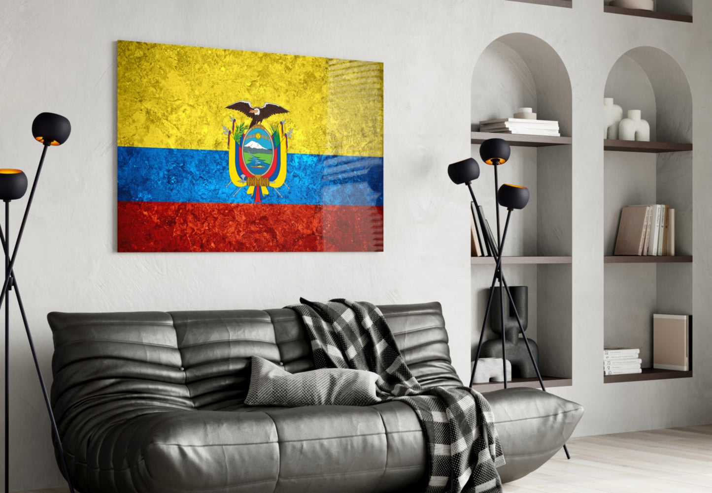 Ecuador flag glass wall art displaying yellow, blue, and red horizontal stripes with coat of arms, hung above black leather sofa in modern living room.