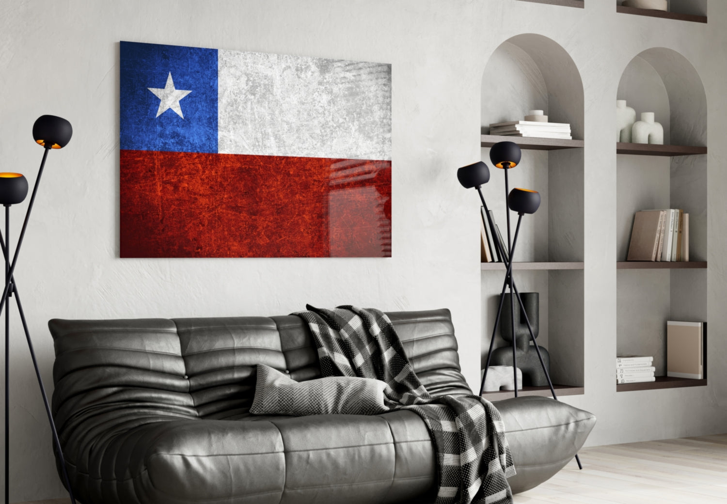 Chilean flag glass wall art displayed above black leather sofa in modern living room interior.