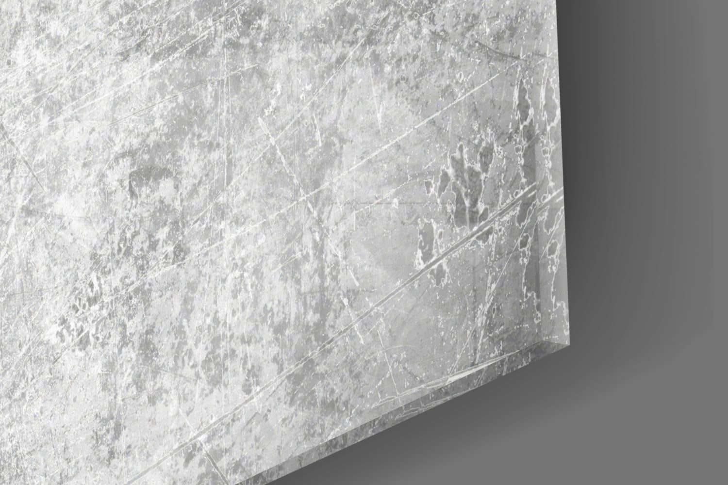 Close-up detail of frosted glass surface showing textured finish and subtle blue cross pattern of Finnish flag design.