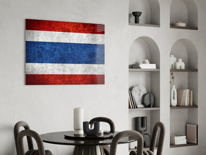 Thai flag glass wall art with red, white, and blue horizontal stripes displayed above a dining table in a modern interior.