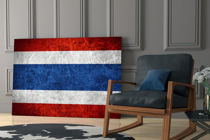 Thai flag glass wall art displaying red, white, and blue horizontal stripes displayed in modern living room interior.