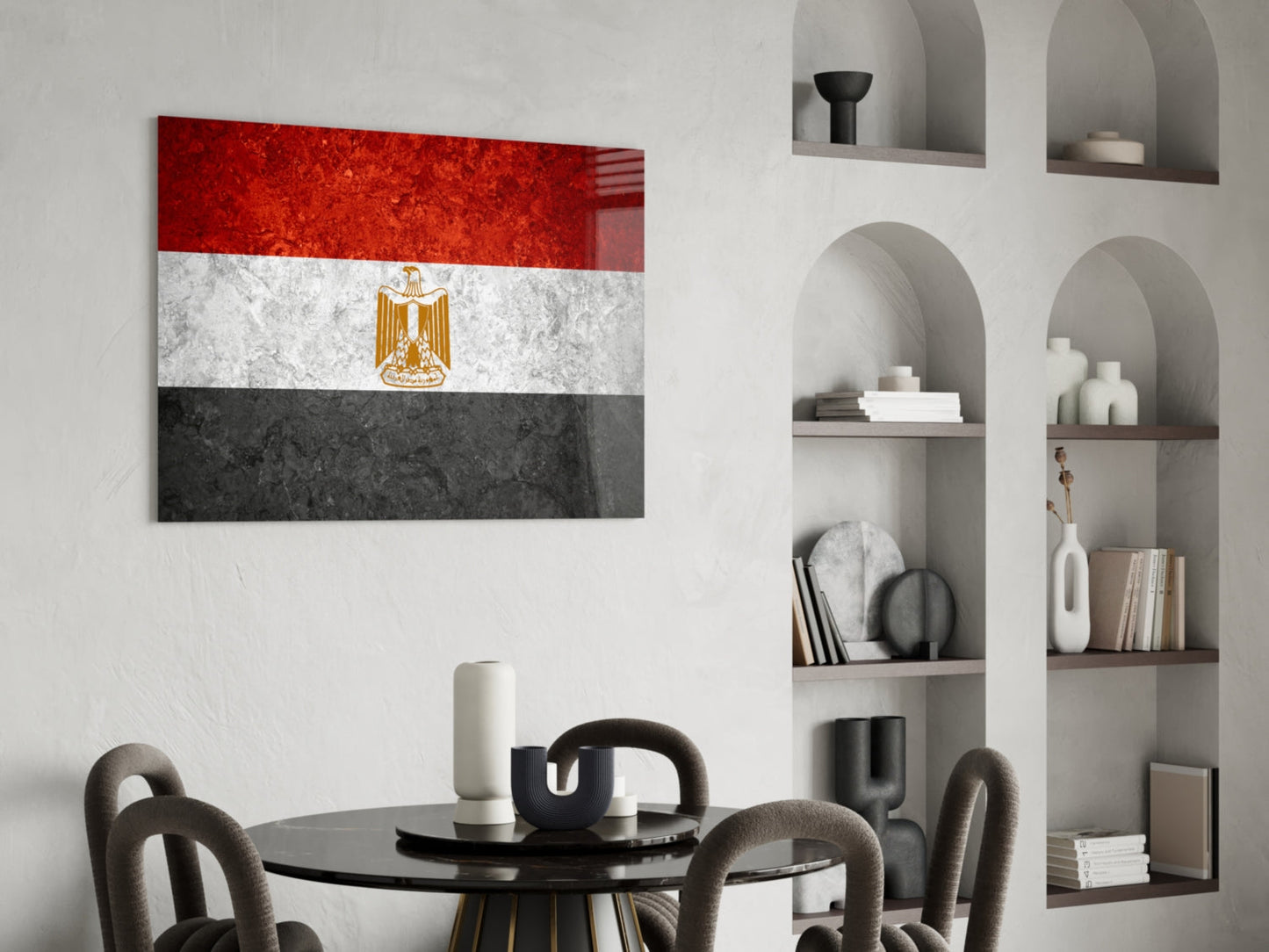 Egyptian flag glass wall art with red, white, and black horizontal stripes and gold eagle emblem displayed above dining table.