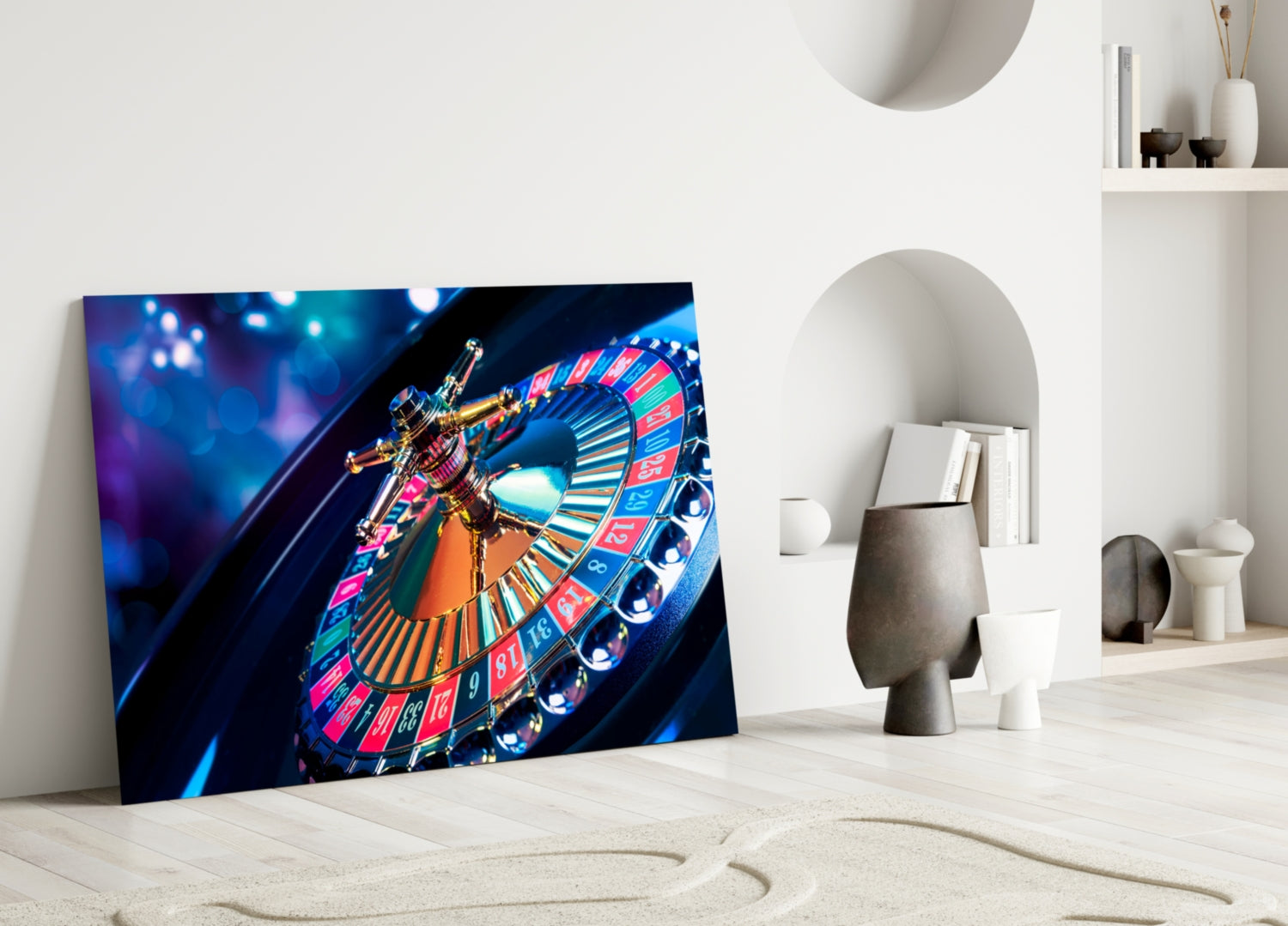 Roulette glass wall art leaning against white wall in minimalist interior, displaying vibrant illuminated roulette wheel with red, blue, and gold details.