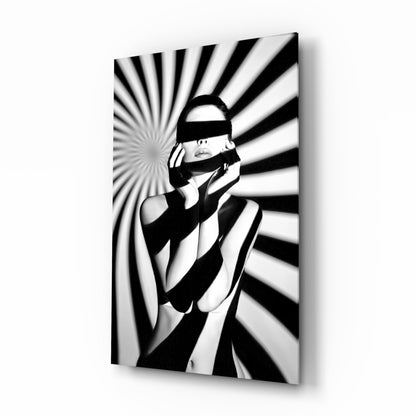 Black and white glass wall art featuring a figure wearing headphones and eye mask against a radiating striped background pattern.