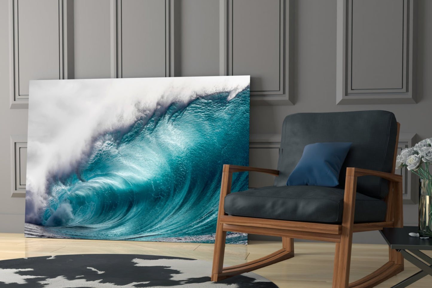 Turquoise wave glass wall art displayed on floor beside mid-century wooden chair in modern interior setting.