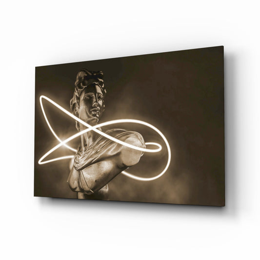 Angled perspective of sepia-toned glass wall art featuring classical bust with glowing neon loop design.