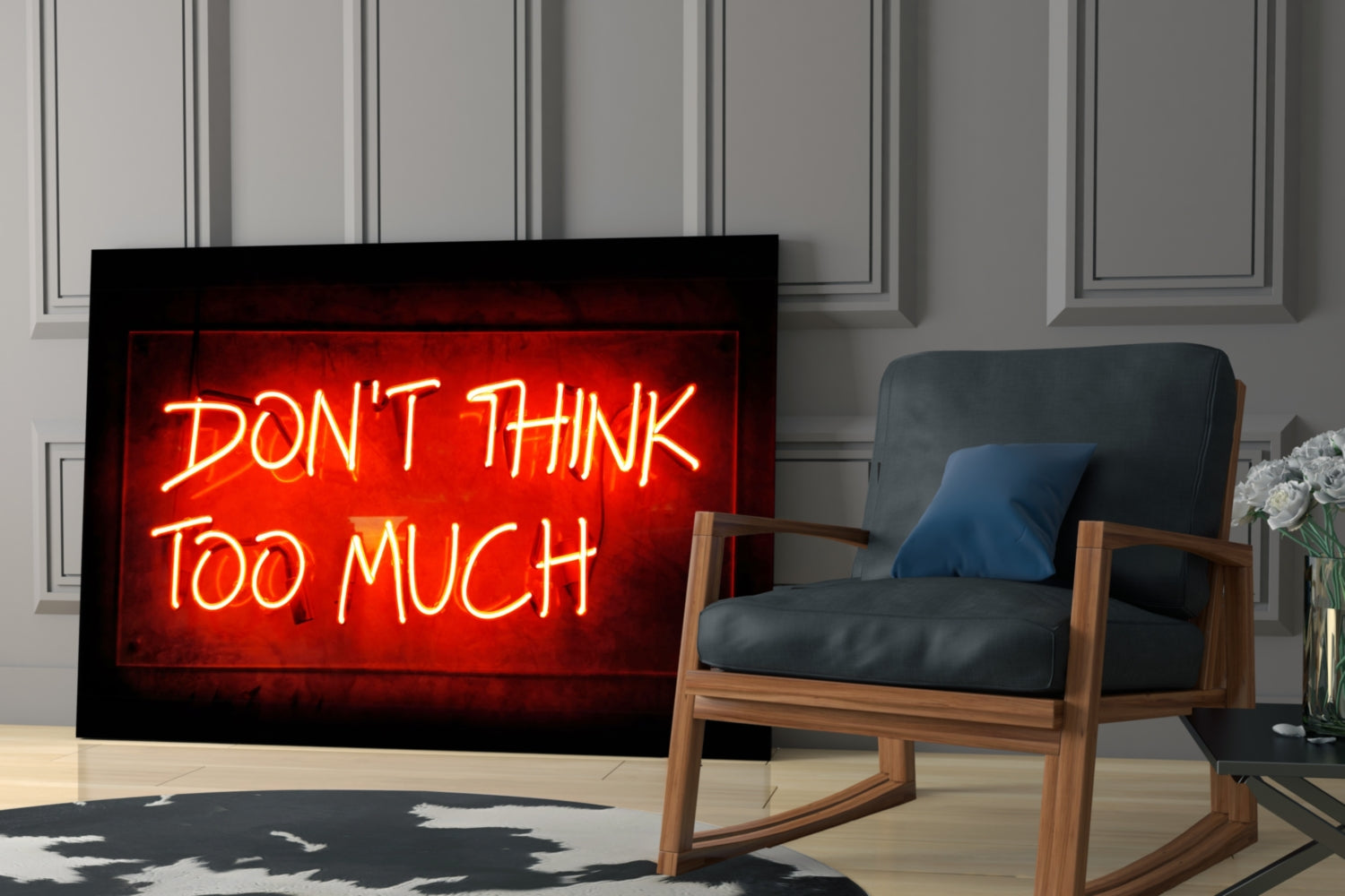 Red neon sign reading "DON'T THINK TOO MUCH" displayed in modern living room with wooden chair and potted flowers.