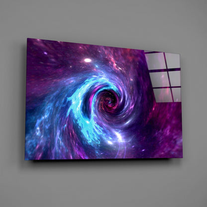 Wall-mounted glass art panel displaying a luminous purple and blue spiral galaxy vortex against gray wall background.
