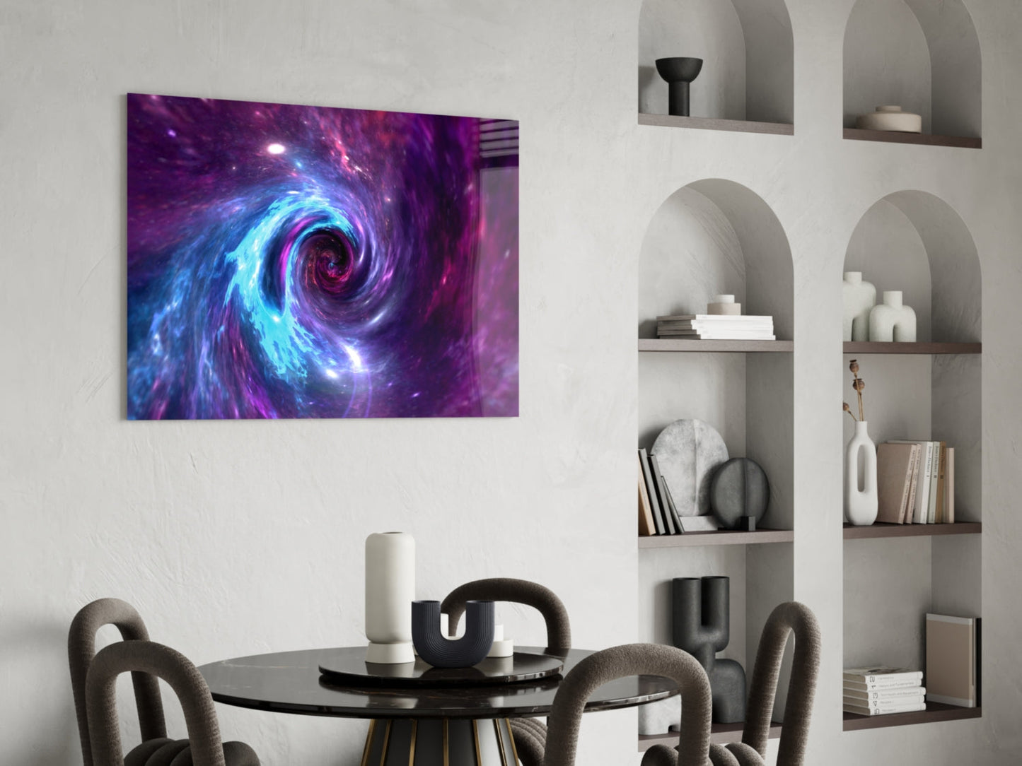 Space Helix Glass Wall Art displaying a vibrant purple and blue spiral galaxy design, hung above a round black dining table.