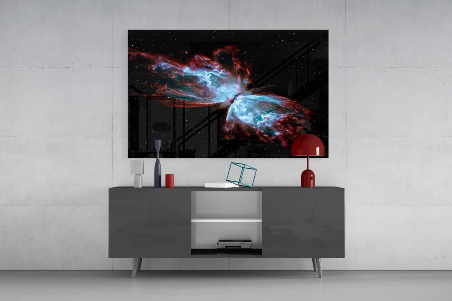 Modern living room with Space Red Glass Wall Art displaying a nebula with blue and red cosmic clouds mounted above a gray media console.