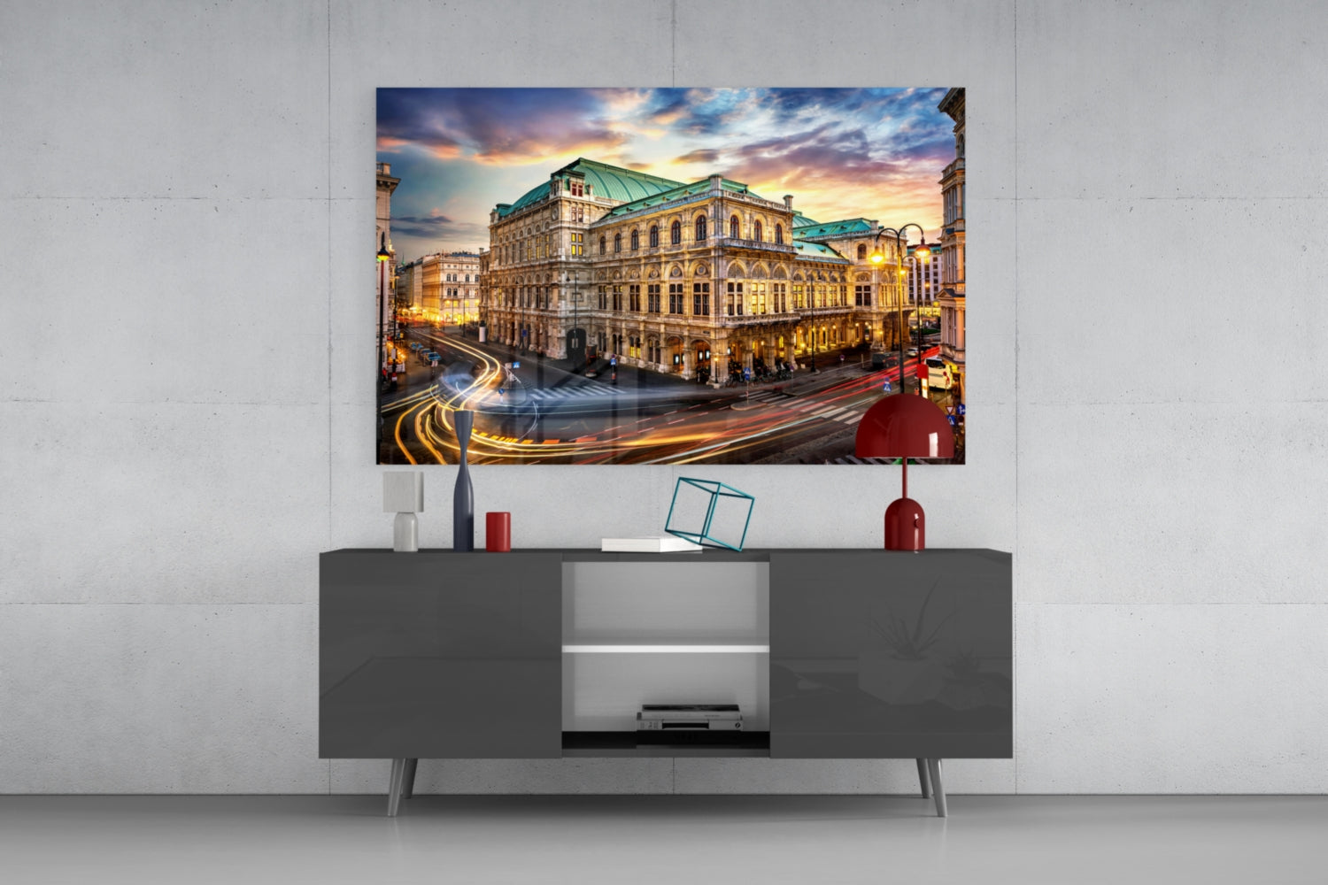 Vienna State Opera House glass wall art displayed above a dark gray media console in a modern living room setting.