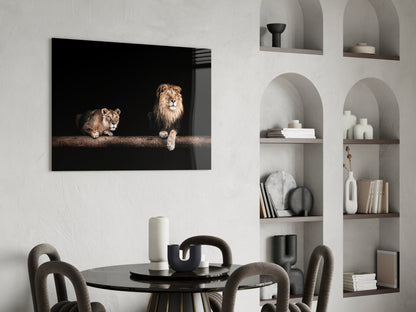 Lion and Lioness Resting on Log Glass Wall Art